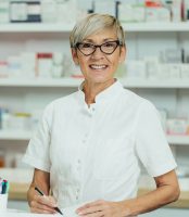 portrait-of-a-beautiful-senior-female-pharmacist-w-62TLF75.jpg
